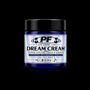 PureForm Labs Dream Cream – GHK-Cu + SNAP-8 Peptide Tallow Cream - PureForm Labs Blue glass jar with black lid containing Dream Cream by PureForm Labs, holographic label visible against black background (2 oz/56 g).